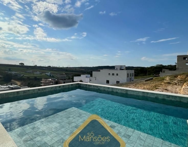 Casa Espaçosa de 450 m² à Venda com 4 Suítes e Vista Espetacular no Condomínio Alphaville, Vespasiano - MG