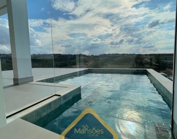 Casa Espaçosa de 450 m² à Venda com 4 Suítes e Vista Espetacular no Condomínio Alphaville, Vespasiano - MG