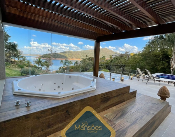 Linda casa com vista para a lagoa de 1116m² à venda em Escarpas do Lago.