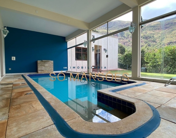 Casa de Alto Padrão de 403 m² à Venda com 3 Suítes e Piscina Aquecida no Condomínio Retiro do Chalé, Brumadinho - MG