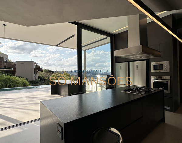 CASA NOVA E MODERNA COM LINDA VISTA CONSTRUÍDA EM UM TERRENO DE 1.149 M2 A VENDA NO CONDOMÍNIO VILA ALPINA.