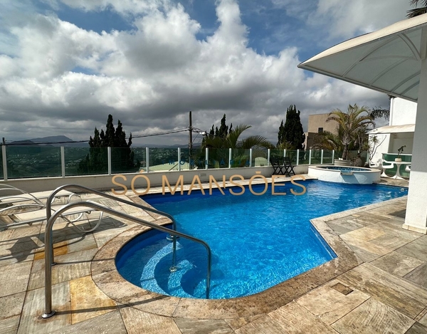 Casa Vila Castela 4 suítes, escritório com entrada independente e piscina aquecida, vista excepcional.