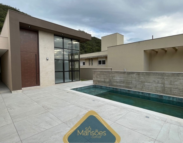 Casa Espaçosa de 387 m² à Venda com 4 Suítes e Piscina Aquecida no Condomínio Quintas do Sol, Nova Lima - MG