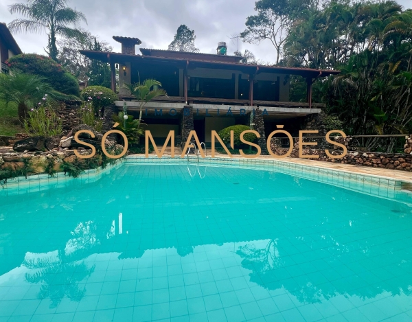 Casa em Terreno Privilegiado de 386 m² à Venda com 1 Suíte e Vista Definitiva no Ouro Velho Mansões, Nova Lima - MG
