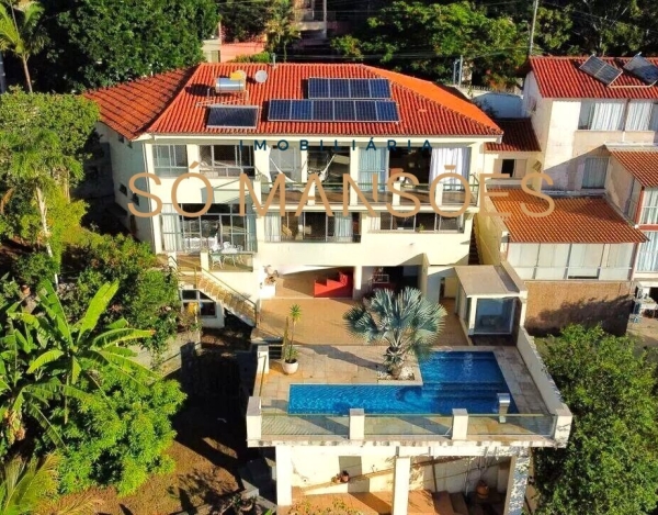 Casa Espaçosa de 470 m² à Venda com 4 Suítes e Espaço Gourmet no Condomínio Nenhum, Belo Horizonte - MG