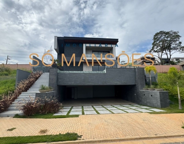 Casa Espaçosa de 437 m² à Venda com 4 Suítes e Vista Definitiva no Condomínio Alphaville, Vespasiano - MG