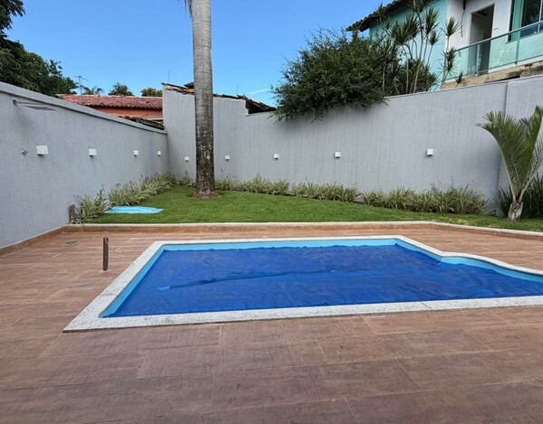 CASA À VENDA NO BAIRRO TREVO – 3 SUÍTES, ENERGIA SOLAR E ÁREA DE LAZER COMPLETA.