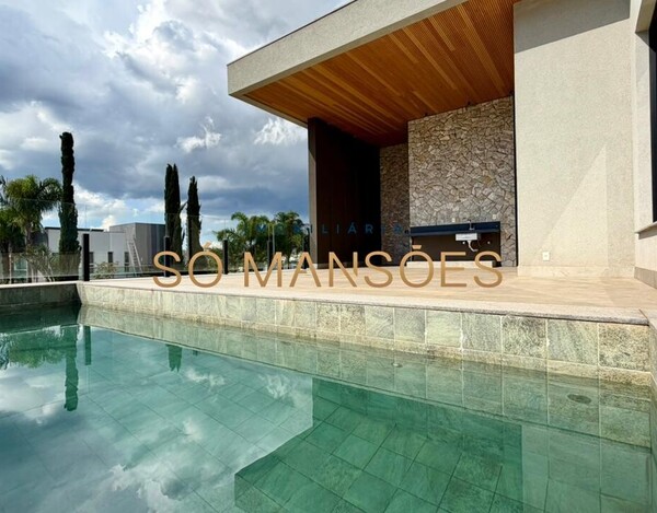 ALPHAVILLE LAGOA DOS INGLESES - CASA LINEAR COM ARQUITETURA CONTEMPORÂNEA E INTEGRAÇÃO TOTAL DOS AMBIENTES.