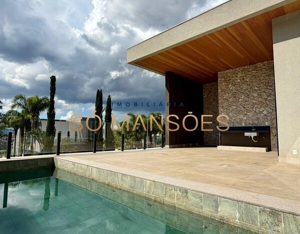 ALPHAVILLE LAGOA DOS INGLESES - CASA LINEAR COM ARQUITETURA CONTEMPORÂNEA E INTEGRAÇÃO TOTAL DOS AMBIENTES.