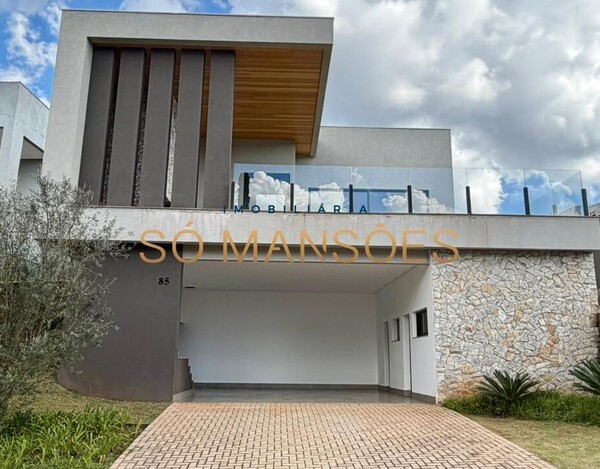 ALPHAVILLE LAGOA DOS INGLESES - CASA LINEAR COM ARQUITETURA CONTEMPORÂNEA E INTEGRAÇÃO TOTAL DOS AMBIENTES.