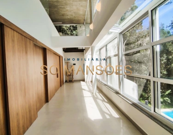 CASA DE 488M² À VENDA EM CONDOMÍNIO DE NOVA LIMA — MODERNA, REFORMADA E COM LAZER INTEGRADO À NATUREZA.