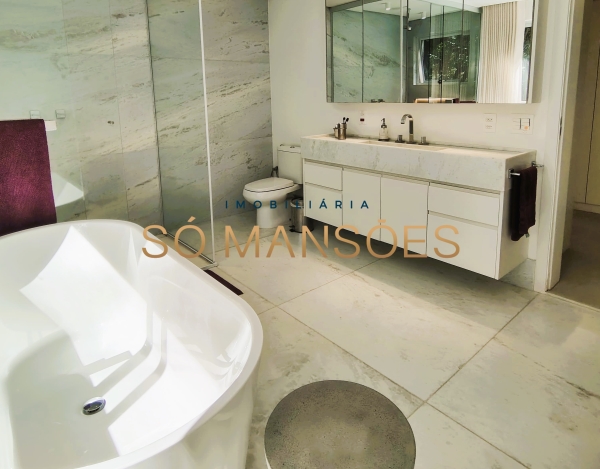 CASA DE 488M² À VENDA EM CONDOMÍNIO DE NOVA LIMA — MODERNA, REFORMADA E COM LAZER INTEGRADO À NATUREZA.
