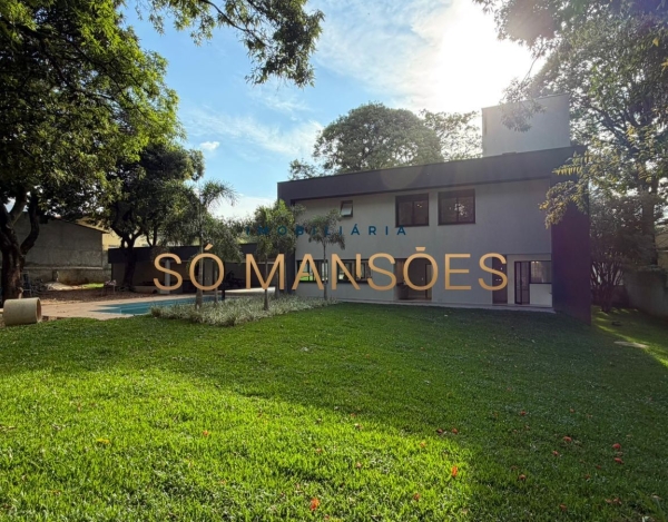 CASA DE 470M² À VENDA NO BANDEIRANTES — SOFISTICAÇÃO, PRIVACIDADE E MUITO VERDE NA PAMPULHA.