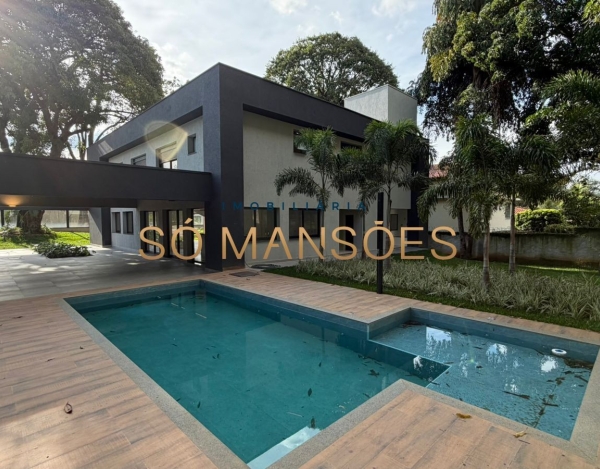 CASA DE 470M² À VENDA NO BANDEIRANTES — SOFISTICAÇÃO, PRIVACIDADE E MUITO VERDE NA PAMPULHA.