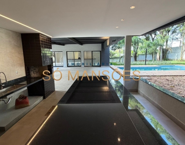 CASA DE 470M² À VENDA NO BANDEIRANTES — SOFISTICAÇÃO, PRIVACIDADE E MUITO VERDE NA PAMPULHA.