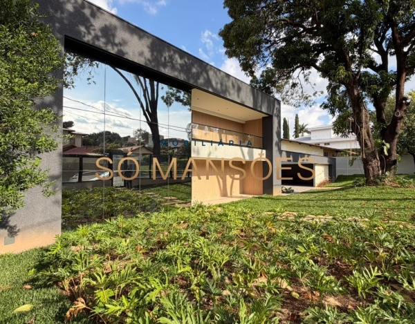 CASA DE 470M² À VENDA NO BANDEIRANTES — SOFISTICAÇÃO, PRIVACIDADE E MUITO VERDE NA PAMPULHA.