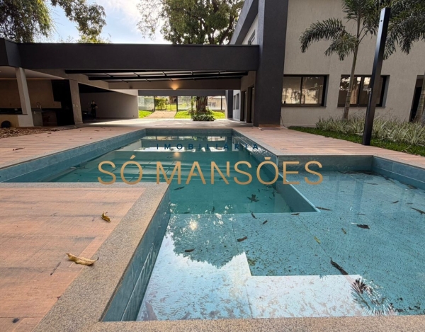 CASA DE 470M² À VENDA NO BANDEIRANTES — SOFISTICAÇÃO, PRIVACIDADE E MUITO VERDE NA PAMPULHA.