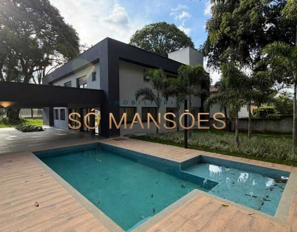 CASA DE 470M² À VENDA NO BANDEIRANTES — SOFISTICAÇÃO, PRIVACIDADE E MUITO VERDE NA PAMPULHA.
