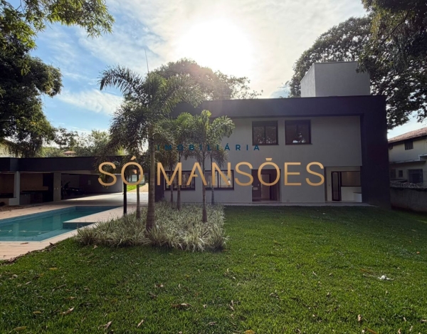 CASA DE 470M² À VENDA NO BANDEIRANTES — SOFISTICAÇÃO, PRIVACIDADE E MUITO VERDE NA PAMPULHA.