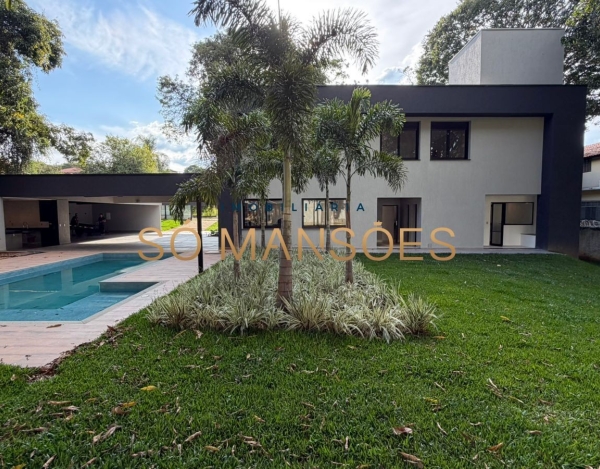 CASA DE 470M² À VENDA NO BANDEIRANTES — SOFISTICAÇÃO, PRIVACIDADE E MUITO VERDE NA PAMPULHA.