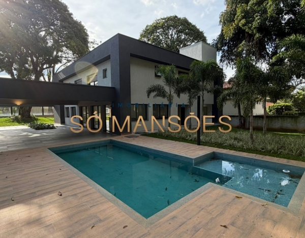 CASA DE 470M² À VENDA NO BANDEIRANTES — SOFISTICAÇÃO, PRIVACIDADE E MUITO VERDE NA PAMPULHA.