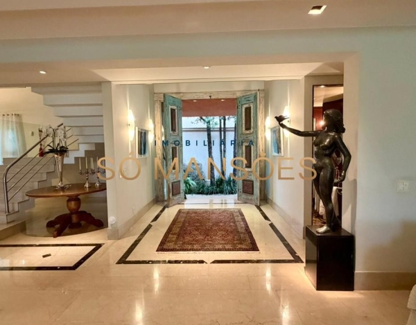 CASA DE 1.079M² À VENDA NO BELVEDERE — RESIDÊNCIA IMPONENTE EM 3 LOTES COM LAZER COMPLETO E AMPLA ÁREA VERDE.