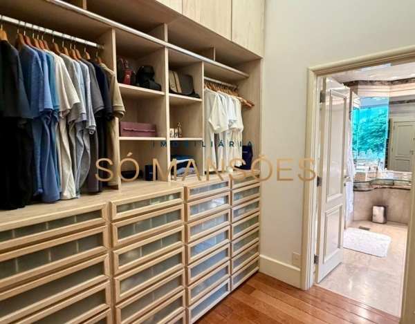 CASA DE 1.079M² À VENDA NO BELVEDERE — RESIDÊNCIA IMPONENTE EM 3 LOTES COM LAZER COMPLETO E AMPLA ÁREA VERDE.