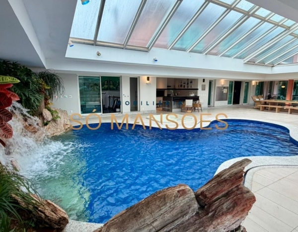 CASA DE 1.079M² À VENDA NO BELVEDERE — RESIDÊNCIA IMPONENTE EM 3 LOTES COM LAZER COMPLETO E AMPLA ÁREA VERDE.