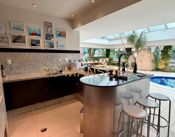 CASA DE 1.079M² À VENDA NO BELVEDERE — RESIDÊNCIA IMPONENTE EM 3 LOTES COM LAZER COMPLETO E AMPLA ÁREA VERDE.