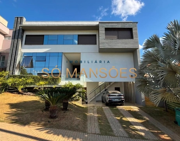Casa de Alto Padrão de 472 m² à Venda com 3 Suítes e Piscina Aquecida no Condomínio Alphaville, Vespasiano - MG