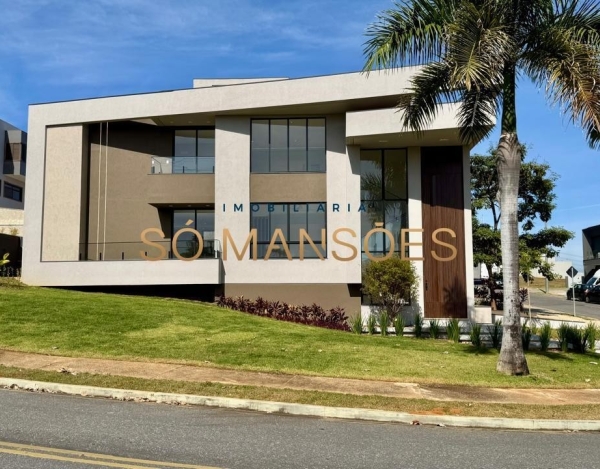 Casa de Luxo no Alphaville Vespasiano — 391m², 4 Quartos, 3 Suítes, Piscina e Energia Solar.