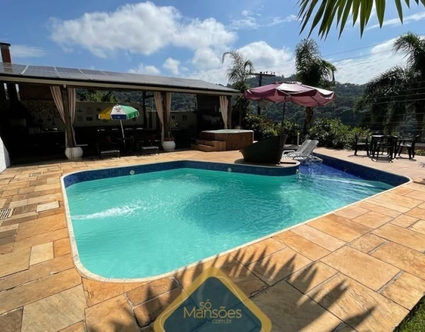 Casa Espaçosa de 1.005 m² à Venda com 10 Suítes e Sauna no Ouro Velho Mansões, Nova Lima - MG
