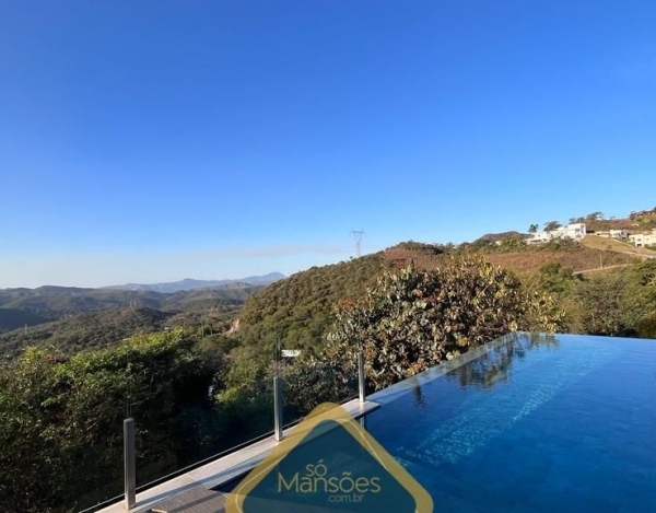 Casa Espaçosa de 406 m² à Venda com 4 Suítes e Vista Definitiva no Mirante da Mata, Nova Lima - MG